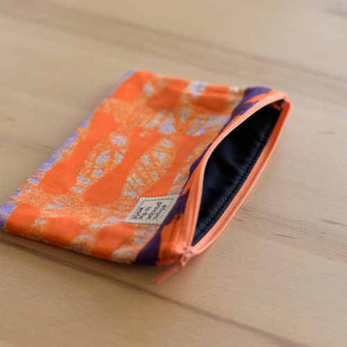 From Príncipe to the World – African pouches orange purple