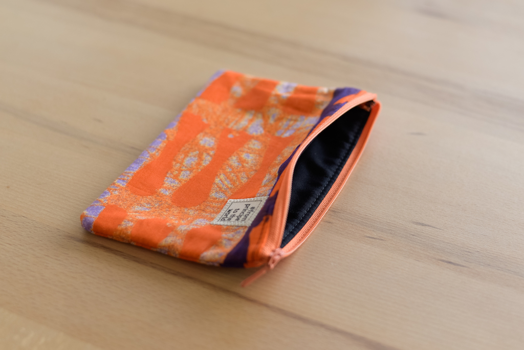 From Príncipe to the World – African pouches orange purple