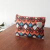 From Príncipe to the World – African pouches orange purple blue black